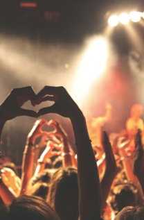 person performing heart hand gesture